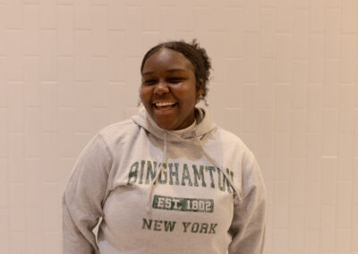 A girl wearing a SUNY Binghamton sweatshirt
